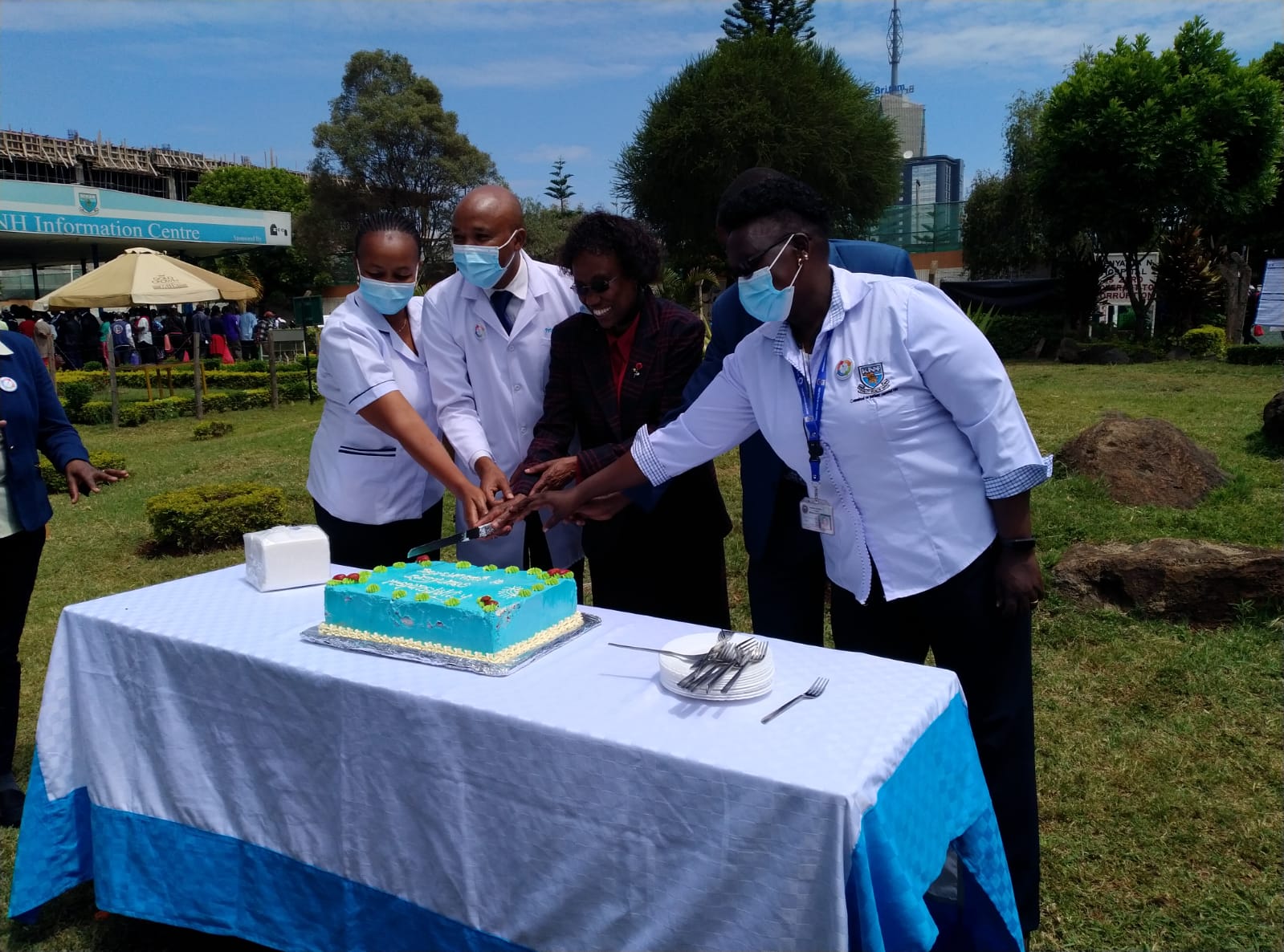 Cake cutting during QI celebrations