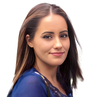 Catriona Kelly with long, straight hair, wearing a blue top, posing against a black background.